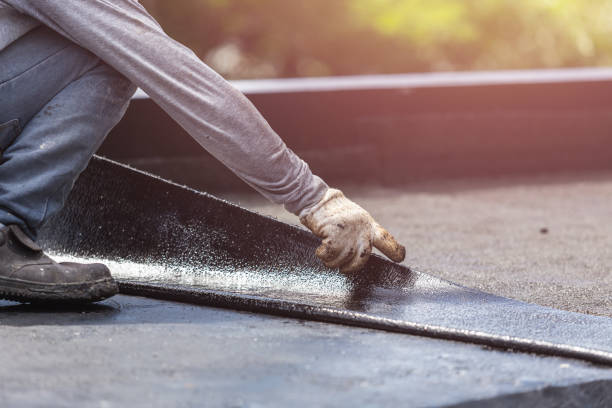 Professional Waterproofing technician working in Portage, MI